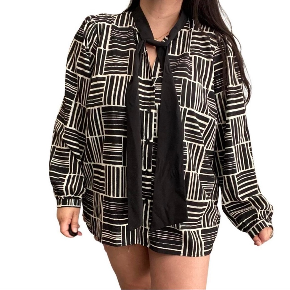 Eloquii black and white fun pattern blouse with bow